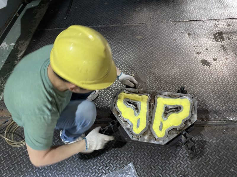 Colorful raw material charging the mold